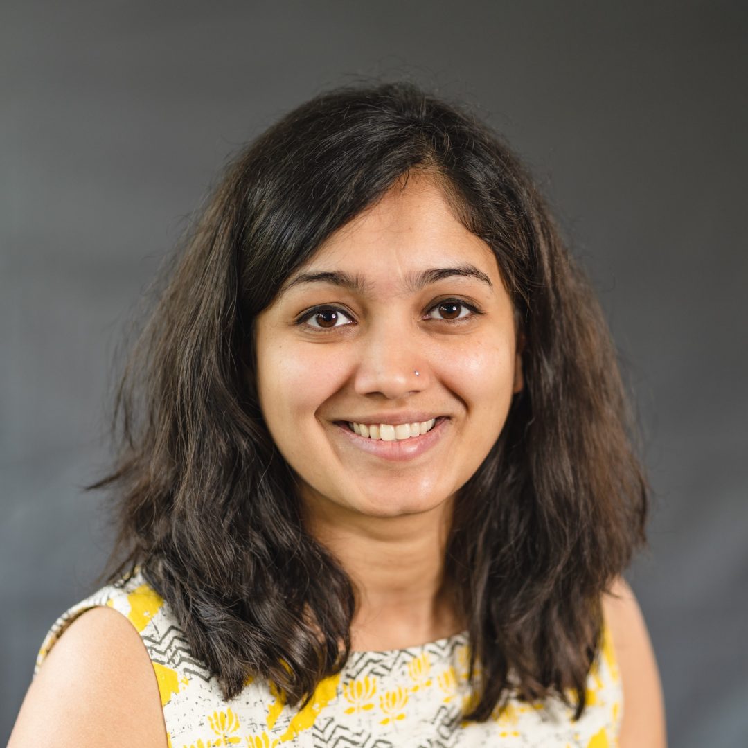 Head shot of smart Asian smiling women